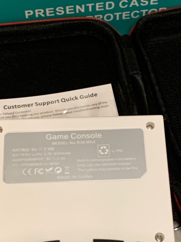 Photo 1 of R36MAX Retro Gaming Console, Retro Handheld Games Console with 64GB TF Card, Portable Hand Held Open Source Linux System, 4.0 inch IPS HD Screen Video Game Consoles, 4000mAh Battery (Light White)