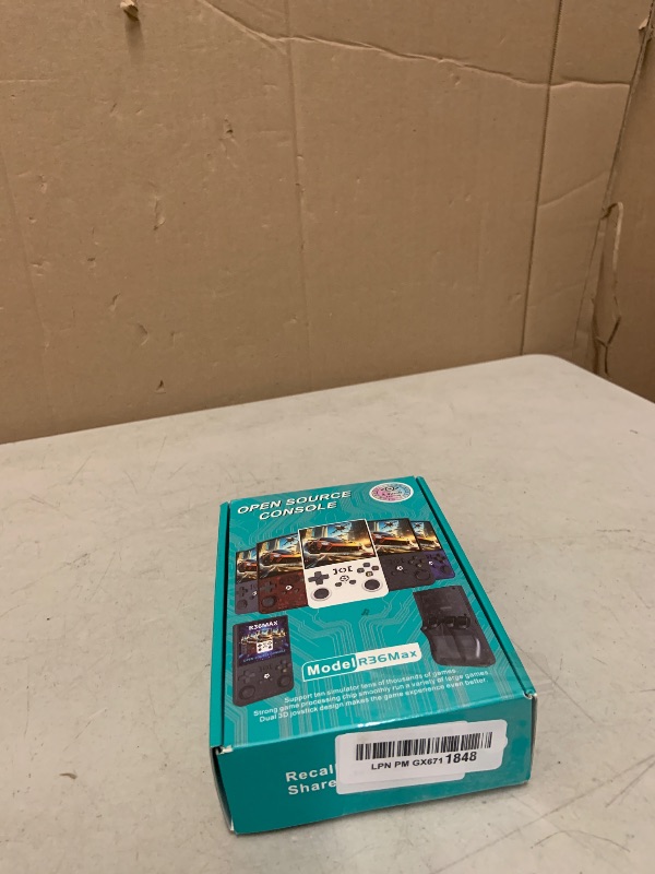 Photo 1 of R36MAX Retro Gaming Console, Retro Handheld Games Console with 64GB TF Card, Portable Hand Held Open Source Linux System, 4.0 inch IPS HD Screen Video Game Consoles, 4000mAh Battery (Light White)