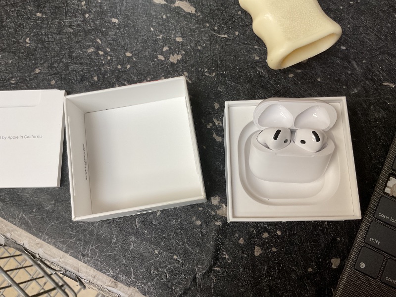 Photo 1 of LOCKED………Apple AirPods 4 Wireless Earbuds, Bluetooth Headphones, with Active Noise Cancellation, Adaptive, Transparency Mode, Personalized Spatial Audio, USB-C Charging Case, Wireless Charging, H2 Chip