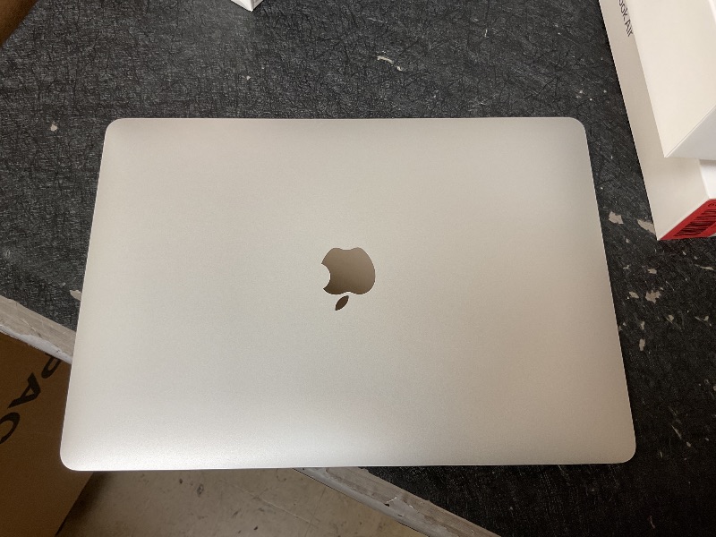 Photo 1 of 2020 Apple MacBook Air Laptop: Apple M1 Chip, 13” Retina Display, 8GB RAM, 256GB SSD Storage, Backlit Keyboard, FaceTime HD Camera, Touch ID. Works with iPhone/iPad; Silver