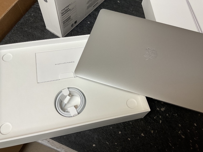 Photo 1 of 2020 Apple MacBook Air Laptop: Apple M1 Chip, 13” Retina Display, 8GB RAM, 256GB SSD Storage, Backlit Keyboard, FaceTime HD Camera, Touch ID. Works with iPhone/iPad; Silver