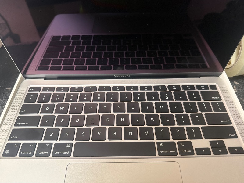 Photo 1 of 2020 Apple MacBook Air Laptop: Apple M1 Chip, 13” Retina Display, 8GB RAM, 256GB SSD Storage, Backlit Keyboard, FaceTime HD Camera, Touch ID. Works with iPhone/iPad; Silver