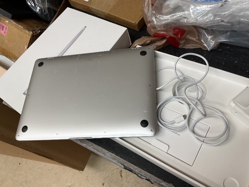 Photo 1 of 2020 Apple MacBook Air Laptop: Apple M1 Chip, 13” Retina Display, 8GB RAM, 256GB SSD Storage, Backlit Keyboard, FaceTime HD Camera, Touch ID. Works with iPhone/iPad; Silver