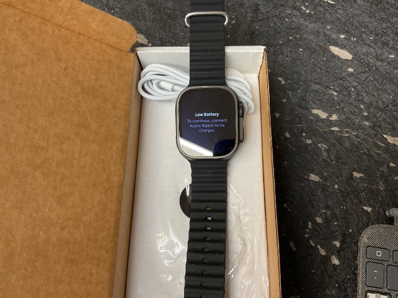 Photo 5 of Apple Watch Ultra 2 (GPS + Cellular, 49MM) - Black Titanium Case with Black Ocean Band (Renewed)
