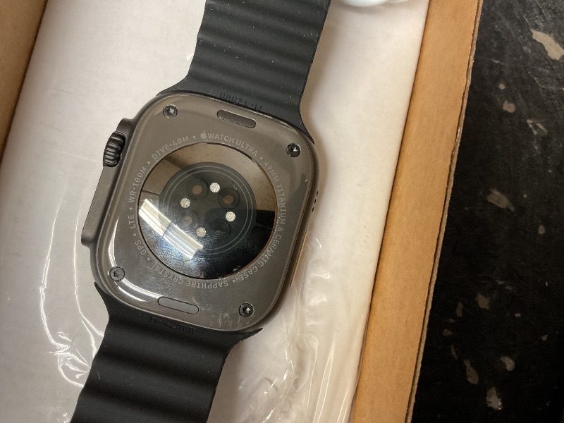 Photo 6 of Apple Watch Ultra 2 (GPS + Cellular, 49MM) - Black Titanium Case with Black Ocean Band (Renewed)