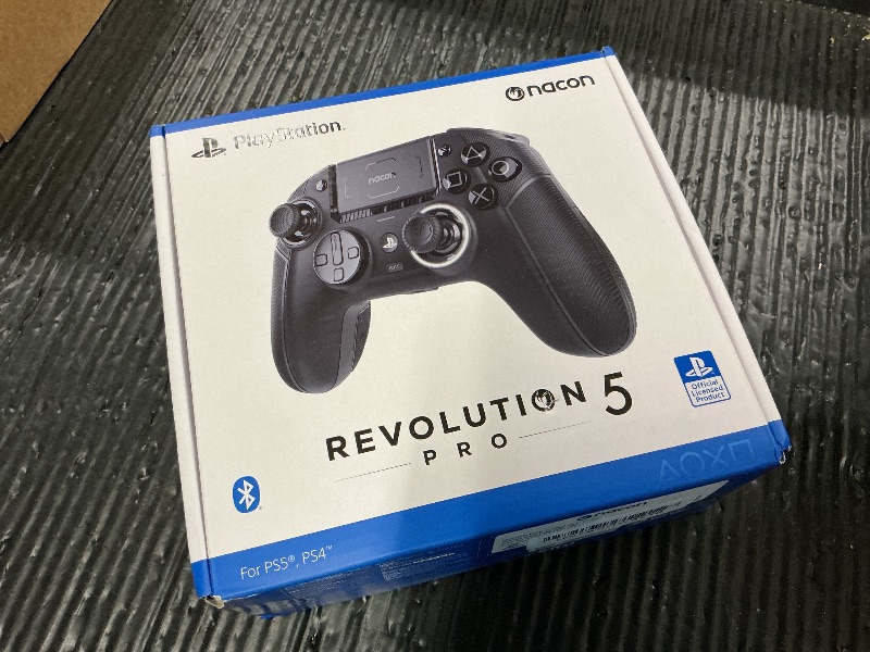 Photo 1 of NACON Revolution 5 Pro Officially Licensed PlayStation Wireless Gaming Controller for PS5 / PS4 / PC - Hall Effect, Trigger Stops, Mappable Buttons, Bluetooth Audio - Triple Black