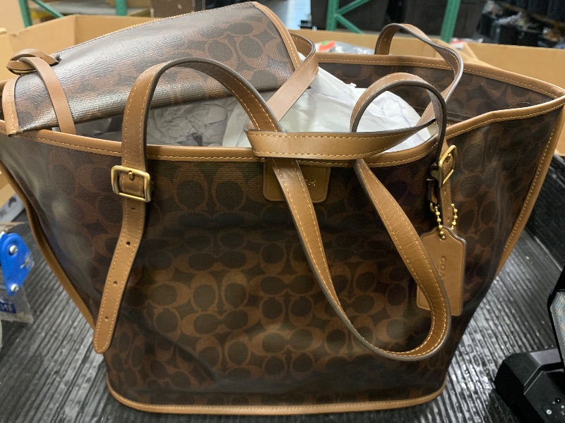 Photo 1 of COACH Women's Taxi Tote Bag In Signature Canvas Maple Sable One Size