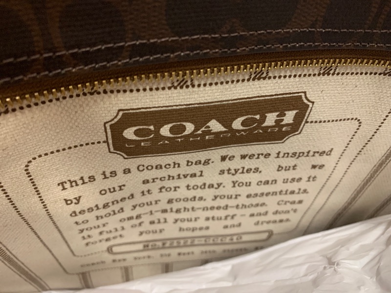 Photo 1 of COACH Women's Taxi Tote Bag In Signature Canvas Maple Sable One Size