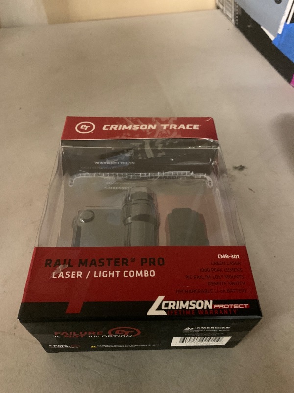 Photo 1 of SELLING FOR PARTS ONLY …..Crimson Trace CMR-301 Railmaster Pro with Green Laser, Adjustable 1000 Lumen LED Flashlight and Rechargeable Battery for Shooting, Competition and Range