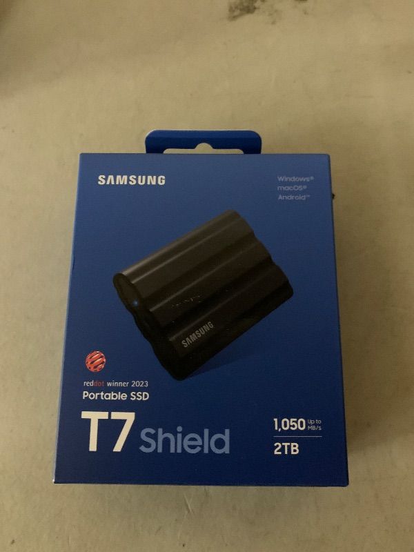 Photo 1 of Samsung T7 Shield 2TB, Portable SSD, up-to 1050MB/s, USB 3.2 Gen2, Rugged,IP65 Water & Dust Resistant, for Photographers, Content Creators and Gaming, Extenal Solid State Drive (MU-PE2T0S/AM), Black