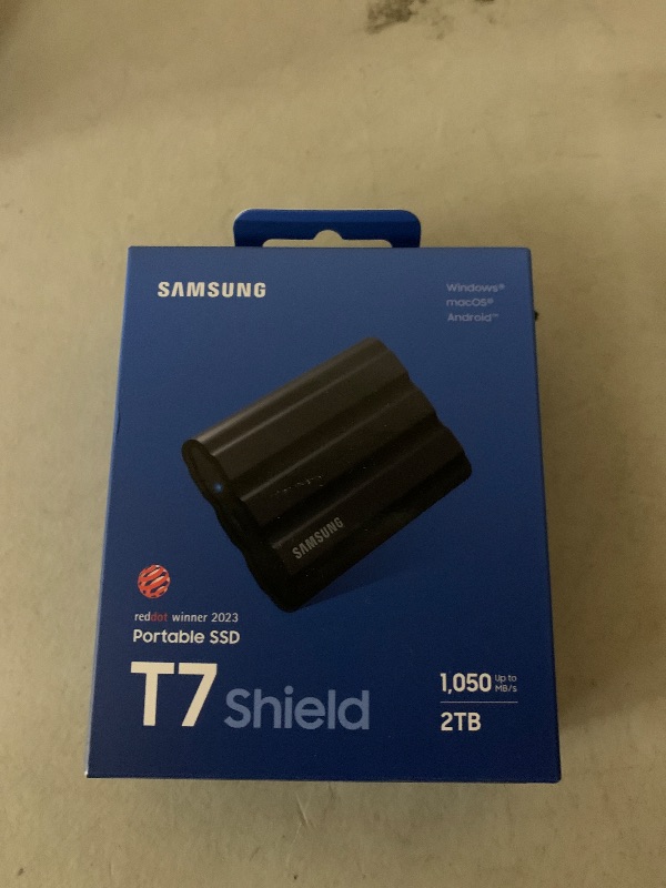 Photo 1 of Samsung T7 Shield 2TB, Portable SSD, up-to 1050MB/s, USB 3.2 Gen2, Rugged,IP65 Water & Dust Resistant, for Photographers, Content Creators and Gaming, Extenal Solid State Drive (MU-PE2T0S/AM), Black