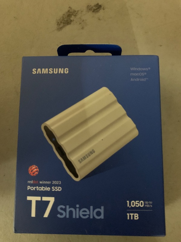 Photo 1 of Samsung T7 Shield Portable External Solid State Drive USB 3.2 1TB, IP65 Water Resistant, Compatible with PC/Mac/Android/Gaming Consoles (MUPE1T0K/AM), Beige