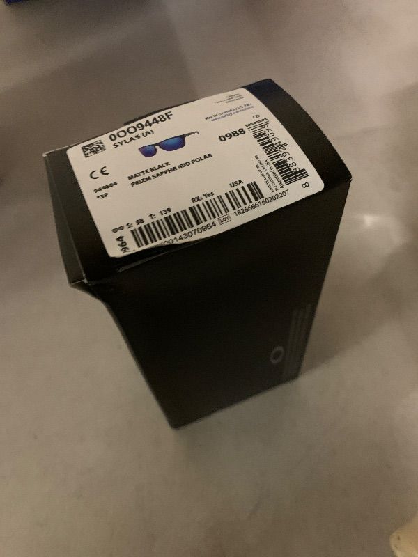 Photo 1 of Oakley Mens OO9448F Sylas Low Bridge Fit Rectangular Sunglasses, Matte Black/Prizm Sapphire Iridium Polarized, 58 mm