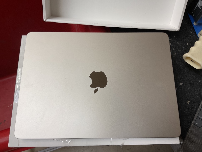 Photo 1 of Apple 2022 MacBook Air Laptop with M2 chip: Built for Apple Intelligence, 13.6-inch Liquid Retina Display, 8GB RAM, 256GB SSD Storage, Backlit Keyboard, 1080p FaceTime HD Camera; Starlight