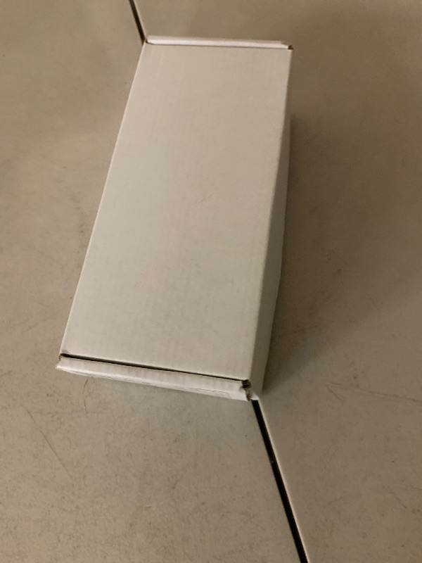 Photo 1 of Apple Watch Ultra 2 (GPS + Cellular, 49MM) - Black Titanium Case with Black Ocean Band (Renewed)