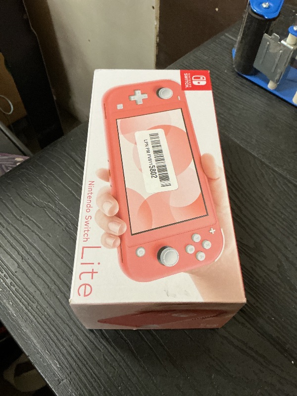 Photo 1 of Nintendo Switch Lite - Coral - Switch