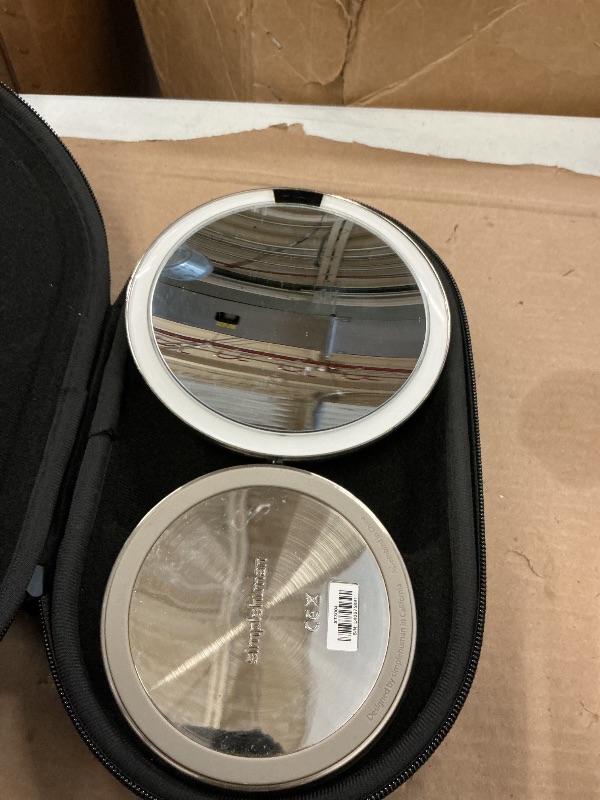 Photo 1 of simplehuman Sensor Mirror, 5" Round Rechargeable Mini Travel Makeup Mirror, 10x Magnification, Brushed Stainless Steel