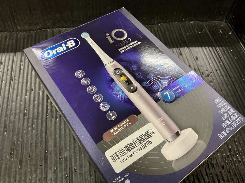 Photo 1 of Oral-B Rechargeable Electric Toothbrush, iO9 Genius, 7 Cleaning Modes, Interactive Display, Charging Travel Case, Visible Pressure Sensor, 4 Brush Heads, Rose Quartz