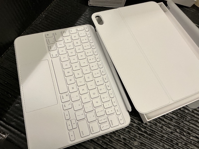Photo 1 of Apple Magic Keyboard Folio: iPad Keyboard and case for iPad (A16 and 10th Generation), Detachable Two-Piece Design that attaches magnetically, Built-in trackpad, US English – White