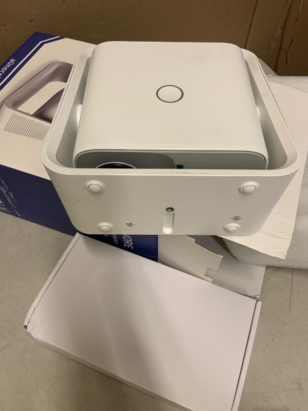 Photo 1 of ALINORE Smart Projector with WiFi and Bluetooth, Built-in Apps, Electric Focus & Auto Keystone Portable Outdoor Projecor, Native 1080P Projector 4K Support, Movie Projector for Home Theater, White