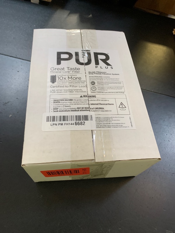 Photo 1 of PUR Plus Vertical Faucet Mount Water Filtration System, Lead-Reducing Water Filter For Sink Faucet, Easy Install, 100 Gallons, Compatible with Sinks with External Aerators, Grey