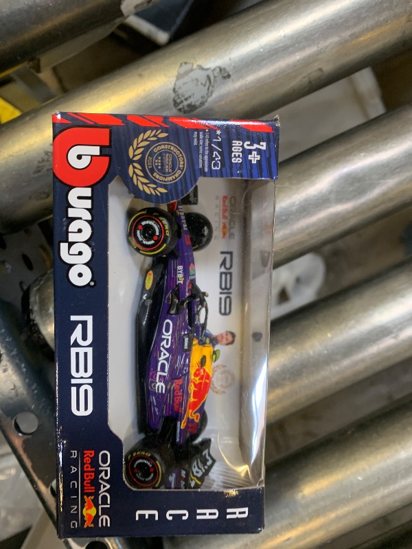 Photo 1 of 1:43 Race Oracle Red Bull Racing RB19 (2023) w/Driver - Verstappen #1