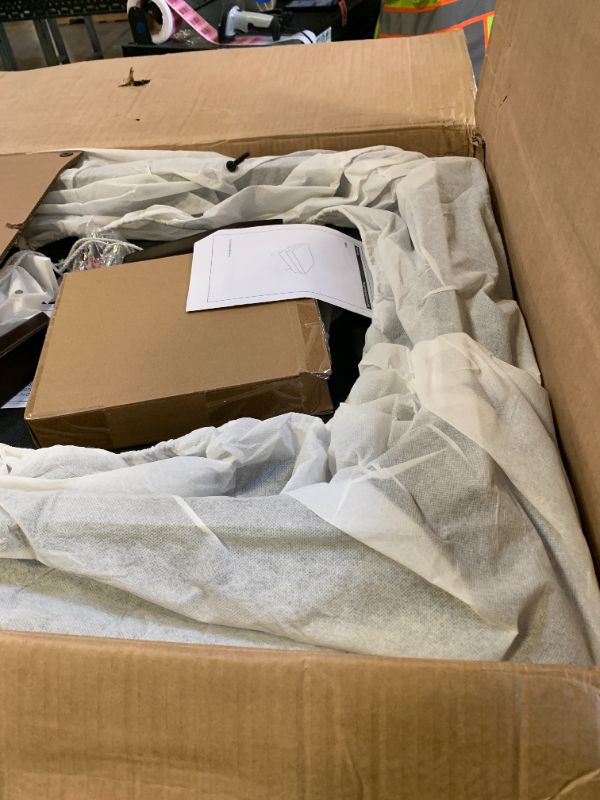 Photo 1 of SIMPLIHOME Owen Coffee Table Storage Ottoman - 34 inch Wide Upholstered Vegan Leather Rectangular Lift-Top Ottoman in Distressed Black, Mid-Century Modern Bench for Living Room with Tapered Legs