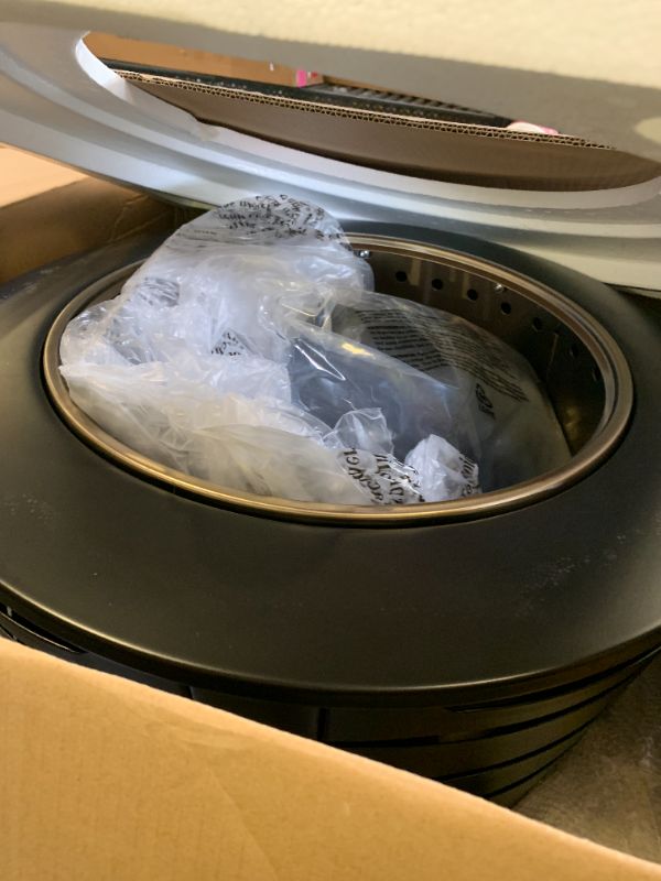 Photo 1 of TIKI Patio Fire Pit Bundle – 25-Inch Smokeless Wood Burning Outdoor Fire Pit for Backyard, Patio, Deck & Garden with Removable Ash Pan, Stand & Weather-Resistant Cover – Modern Black Stainless Steel