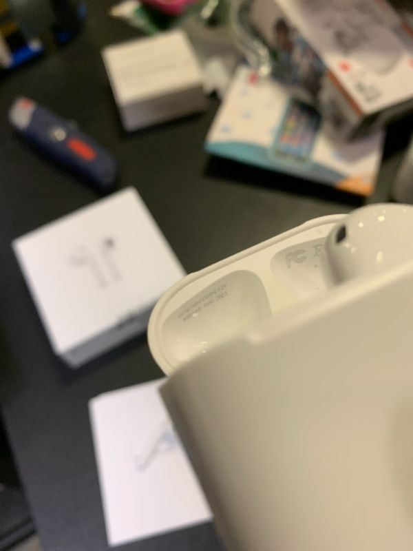 Photo 1 of Apple AirPods Wireless Ear Buds, Bluetooth Headphones with Lightning Charging Case Included, Over 24 Hours of Battery Life, Effortless Setup for iPhone