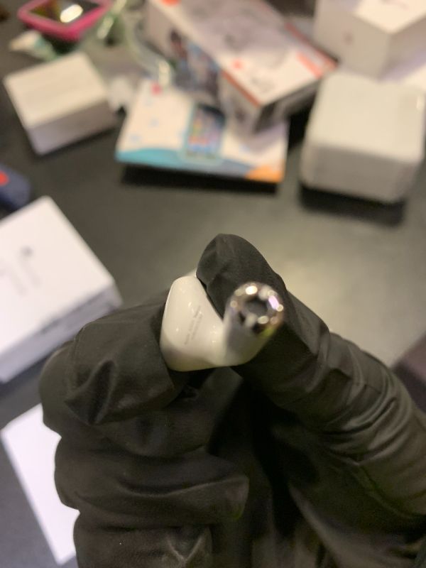 Photo 1 of Apple AirPods Wireless Ear Buds, Bluetooth Headphones with Lightning Charging Case Included, Over 24 Hours of Battery Life, Effortless Setup for iPhone