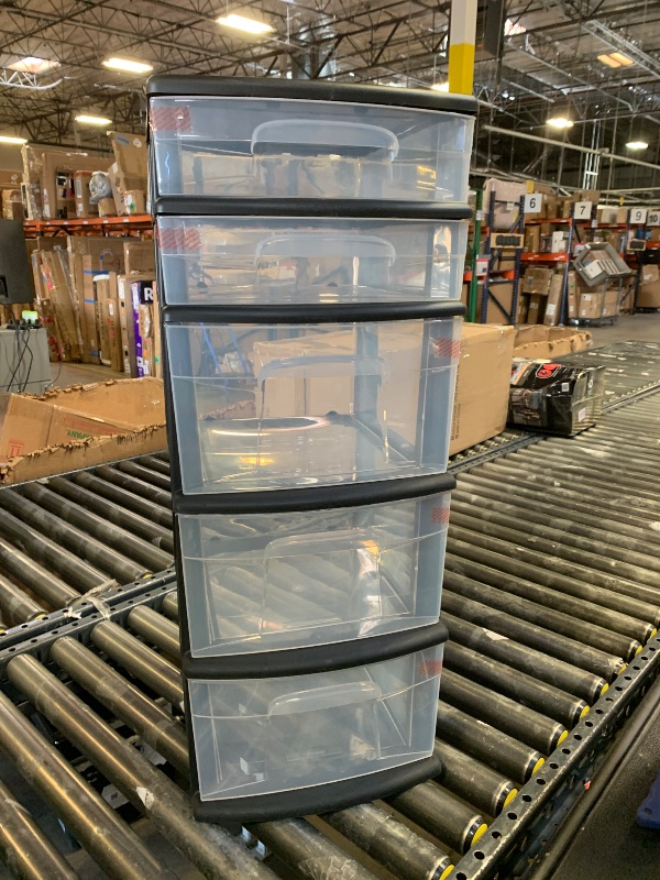 Photo 1 of plastic storage drawer