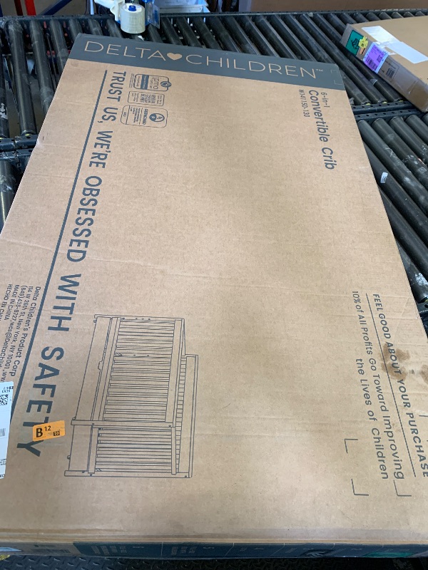 Photo 1 of Delta Children Mercer 6-in-1 Convertible Crib with Storage Trundle, Greenguard Gold Certified, Bianca White