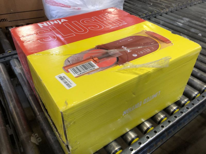 Photo 1 of Ninja SLUSHi Professional Frozen Drink Maker with RapidChill Technology, 88 oz. Frozen Drink & Slushie Machine, 5 Preset Programs, Frozen Margaritas, Frappés, and More, Orange Mango, FS301OR