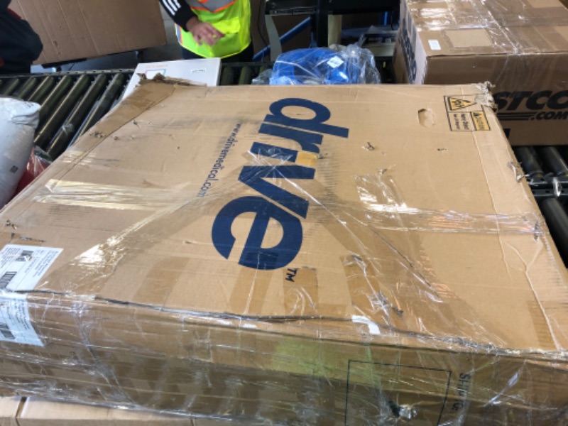 Photo 1 of Drive Medical Blue Streak Lightweight Foldable Wheelchair - Enhanced Mobility Support - Durable Construction - Padded Comfort - Swing-Away Leg Rests - Desk Arms - Blue/Black - 20 Inch Seat