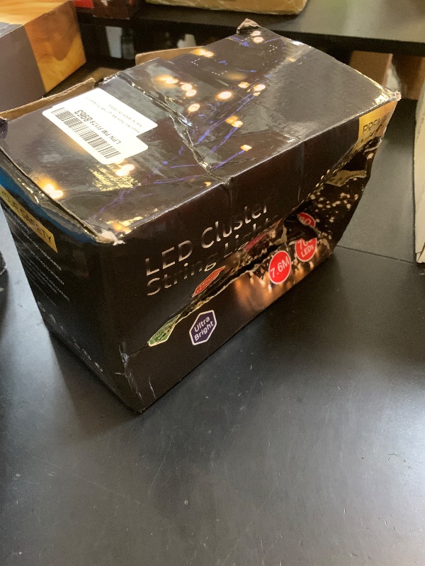 Photo 1 of Areker Christmas Cluster Lights,760LED Warm White Christmas Tree Lights 25ft,8 Modes&Memory Function with Dark Wire, Waterproof Christmas String Lights Outdoor,Indoor,Garden,Wedding