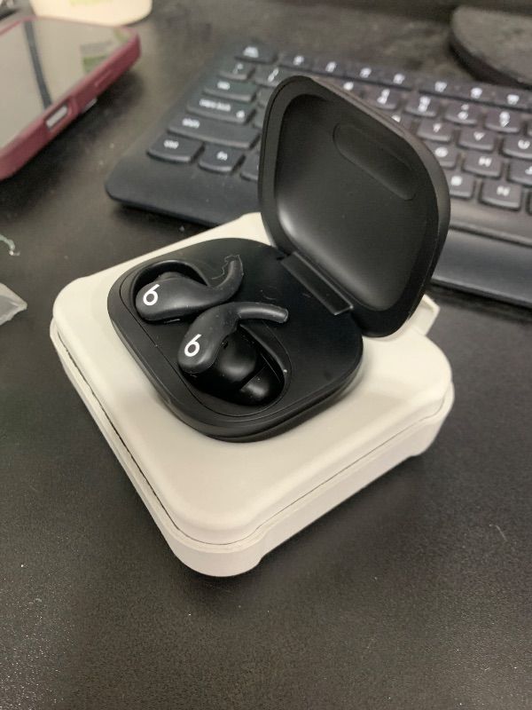 Photo 1 of Beats Powerbeats Fit - Wireless Noise Cancelling Workout Earbuds with Secure-Fit Wingtips, Up to 30-Hour Battery Life, Sweat & Water Resistant, Apple & Android Compatible - Jet Black