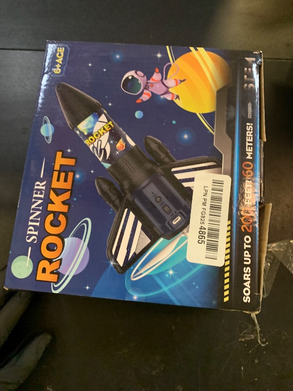 Photo 1 of Rocket Launcher for Kids, 200 ft Self Launching Motorized Rocket Toy with LED and Safety Parachute Land, Outdoor Toys Cool Birthday for Boys Ages 8-12 (Blue)