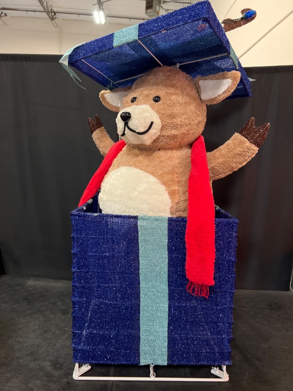 Photo 1 of Holiday Living 4-ft Animatronic LED Reindeer in Giftbox Yard Decoration