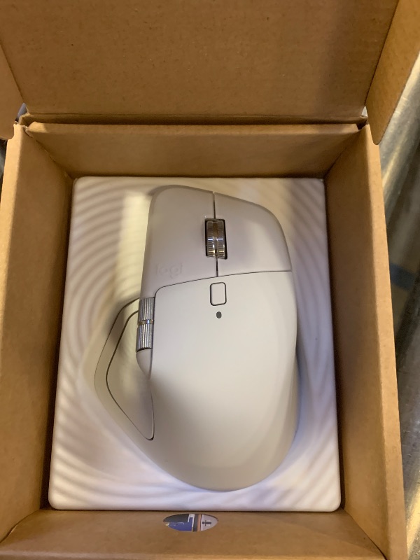 Photo 1 of Logitech MX Master 4 for Mac, Ergonomic Bluetooth Mouse with Advanced Performance Haptic Feedback, Ultra-Fast Scrolling, USB-C Charging, MacOS, iPadOS, Windows - White Silver