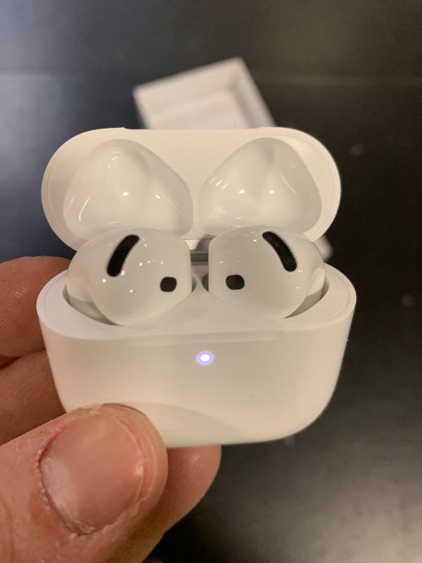 Photo 1 of Apple AirPods 4 Wireless Earbuds, Bluetooth Headphones, Personalized Spatial Audio, Sweat and Water Resistant, USB-C Charging Case, H2 Chip, Up to 30 Hours of Battery Life, Effortless Setup for iPhone (charger missing) 