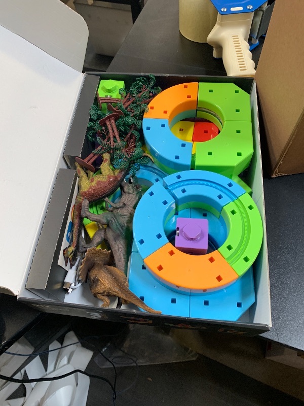 Photo 1 of Electric Train Set with 3D Magic Flexible Race Tracks for Kids, Race Car Track Easy to Detach and Store Dinosaur Toys for 3 4 5 6 7 8 Years Old Boys Girls