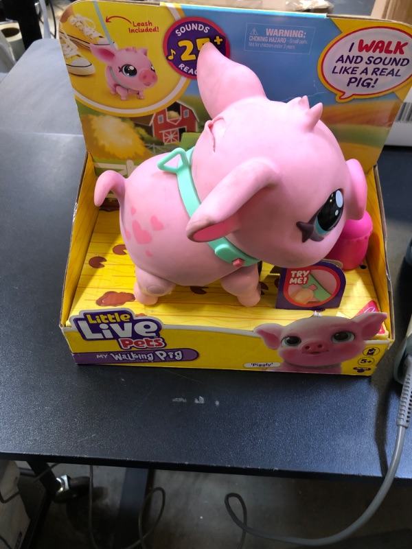 Photo 1 of Little Live Pets My Pet Piggly The Toy Pig, Interactive Walking Pig Toy with 25+ Sounds and Detachable Leash, Pigs Toys for Kids of Ages 5+