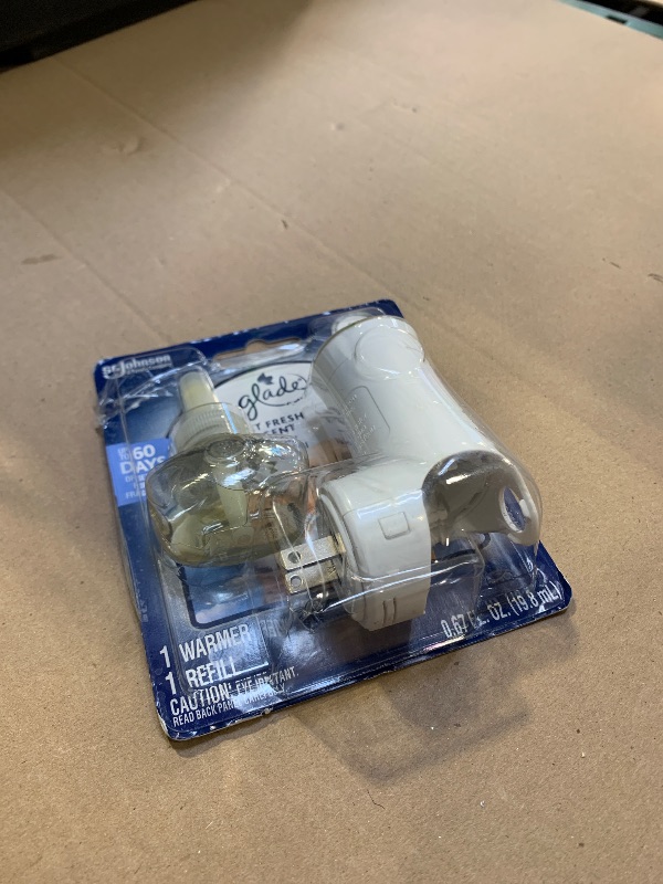 Photo 1 of Glade PlugIns Refills Air Freshener Starter Kit, Pet Fresh Scent, Scented and Essential Oils for Home and Bathroom, 0.67 Fl Oz, 1 Warmer + 1 Refill