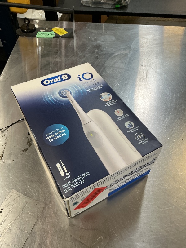 Photo 1 of Oral-B iO Simple Clean Rechargeable Electric Powered Toothbrush, Pure White with 1 Gentle Care Brush Head and 1 White Travel Case - Automatic Pressure Sensor to Protect Gums - 3 Modes -2 Min Timer