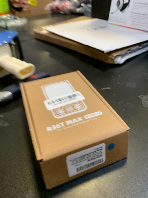 Photo 1 of R36TMAX Retro Handheld Game Console, Portable Retro Gaming Console with 4.0” CRT-Inspired Screen, 4000mAh Arcade Classics, Supports Multiple Emulators, WiFi Network Battling, 64GB (Blue)