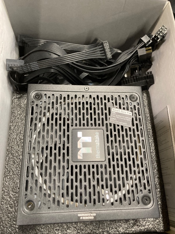 Photo 1 of **SIMILAR ITEM IN BOX.**
Thermaltake Toughpower GF3 Snow Edition 1200W 80+ Gold Full Modular SLI/Crossfire Ready ATX 3.0 Power Supply PCIe Gen.5 600W 12VHPWR Connector Included PS-TPD-1200FNFAGU-N 10 Year Warranty Black.