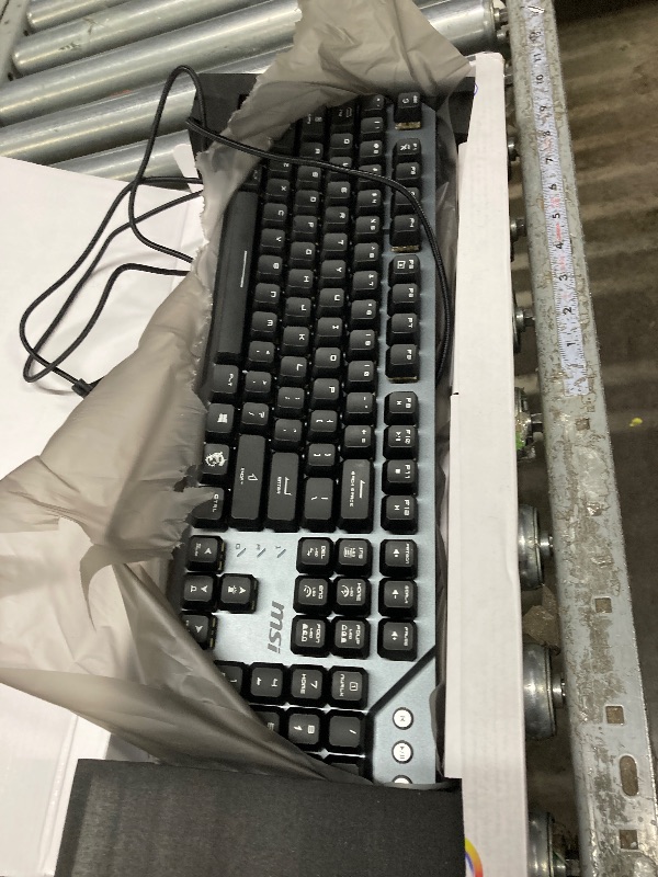 Photo 1 of **It's used, it's missing a part, and it's unknown if it works 100%.***MSI Strike 600 - KAILH Midnight PRO Silent Tactile SWITCHES - Ergonomic Keycaps, Anti-Slip Base, Per-Key RGB Mystic Light, USB 2.0 - Full-Sized