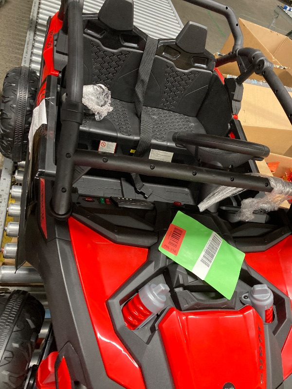 Photo 1 of ** NOT WORKING*** 

Wisairt 24V Ride on Toys 4WD Ride on Cars with Remote Control, 2 XL Seater Electric Car for Kids, Power Car Wheels, UTV w/ 4 Motors, Bluetooth, Music, Lights, 3 Speeds, Red
