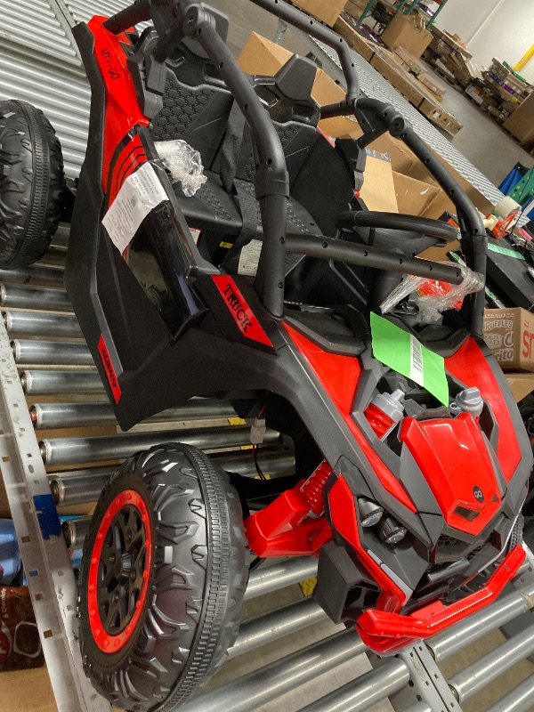 Photo 1 of ** NOT WORKING*** 

Wisairt 24V Ride on Toys 4WD Ride on Cars with Remote Control, 2 XL Seater Electric Car for Kids, Power Car Wheels, UTV w/ 4 Motors, Bluetooth, Music, Lights, 3 Speeds, Red
