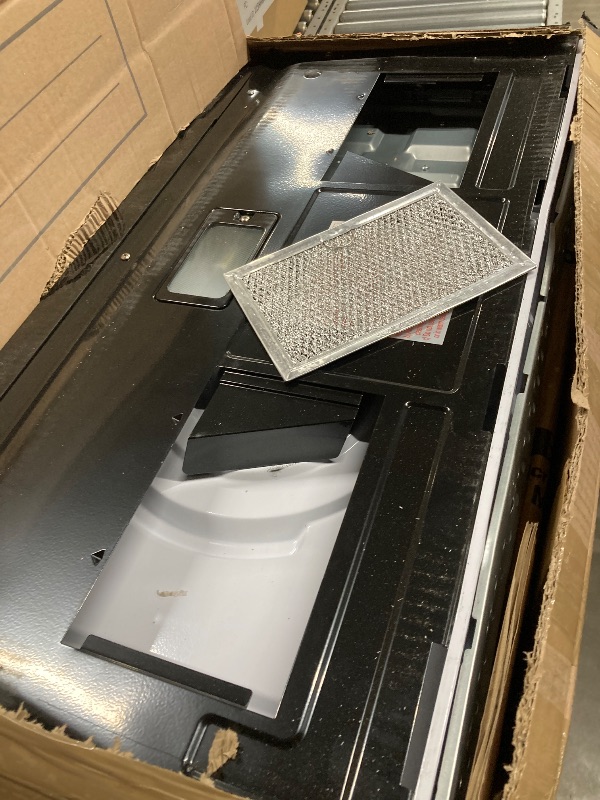 Photo 1 of ***BROKEN DOOR HANDLE/LARGE DENT ON TOP-SEE PICS***


BLACK+DECKER Over the Range Microwave Oven with Vent and One-Touch Auto Cooking, 1.7 cu. ft. OTR Over Stove Microwave, Black, 1000 Watts, EM044K6CF-BK